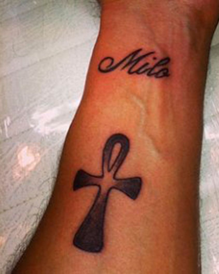 Tattoo, Finger, Skin, Joint, Symbol, Wrist, Font, Muscle, Cross, Temporary tattoo, 