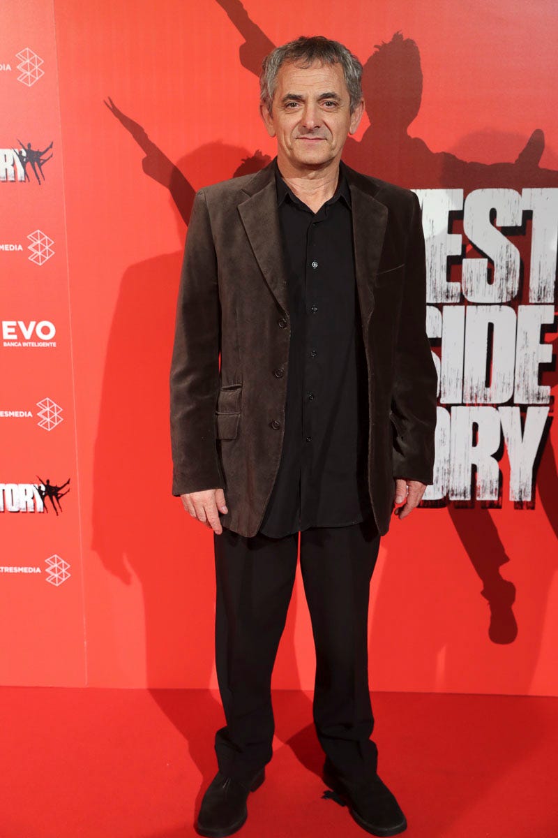 Red, Premiere, Carpet, Red carpet, Suit, Event, Flooring, Tuxedo, Fictional character, Formal wear, 