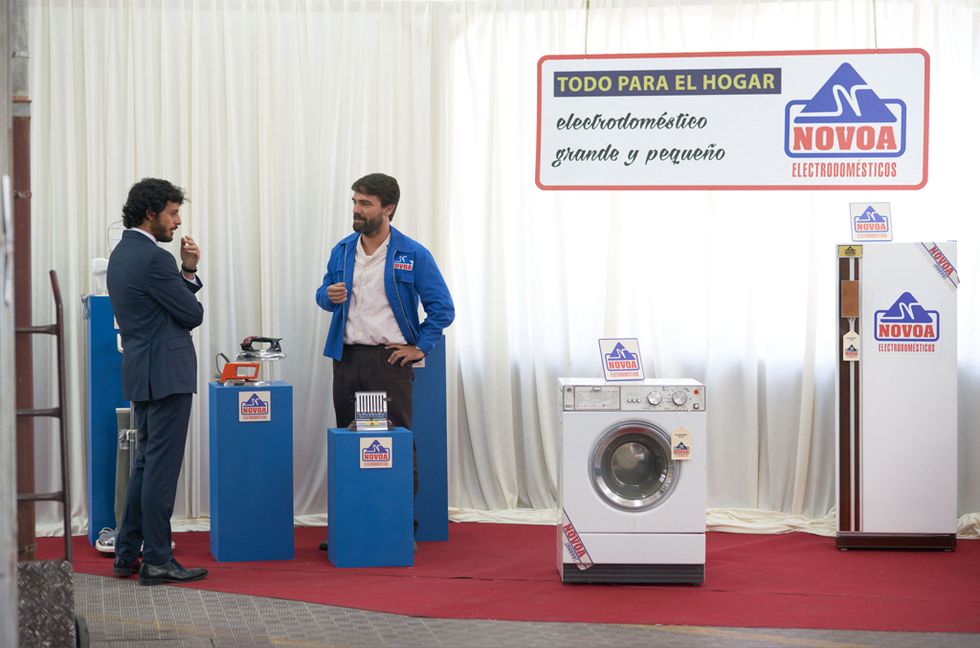 Washing machine, Logo, Clothes dryer, Electric blue, Gas, Machine, Banner, Signage, Advertising, Curtain, 
