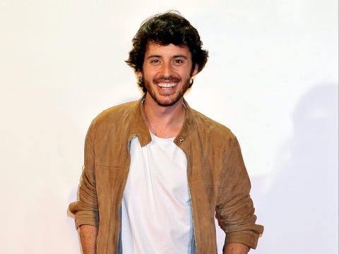 Sleeve, Collar, Dress shirt, Jacket, Jaw, Jheri curl, Facial hair, Tooth, Jewellery, Black hair, 