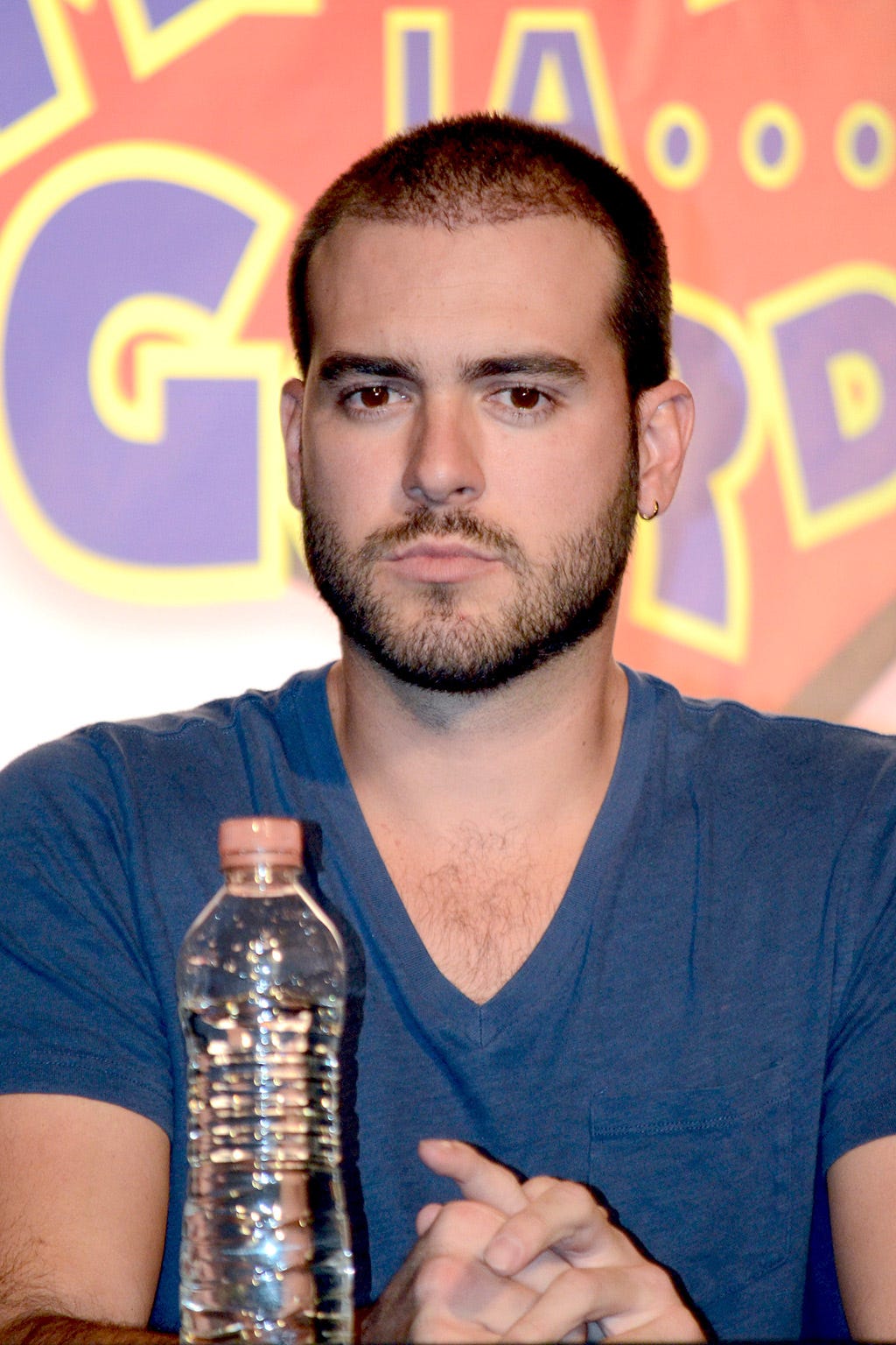 Facial hair, Forehead, Bottled water, Eyebrow, Water bottle, Bottle, Drinkware, Drinking water, Plastic bottle, Beard, 