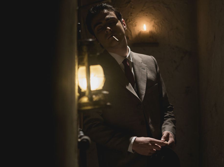 Suit, Darkness, Formal wear, Tuxedo, Photography, Room, Night, Flash photography, Portrait, 