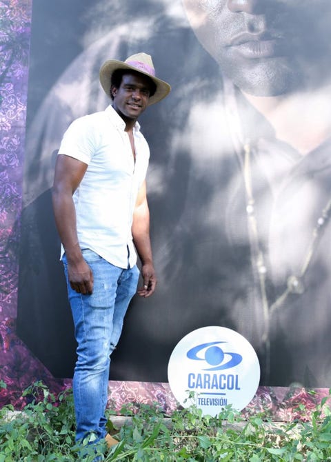 Hat, Trousers, Denim, Jeans, Shirt, Mammal, T-shirt, Sun hat, Logo, Headgear, 