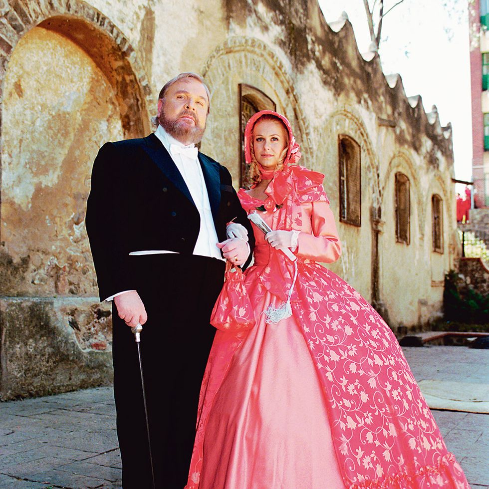 Trousers, Coat, Photograph, Outerwear, Dress, Suit, Formal wear, Pink, Gown, Tradition, 