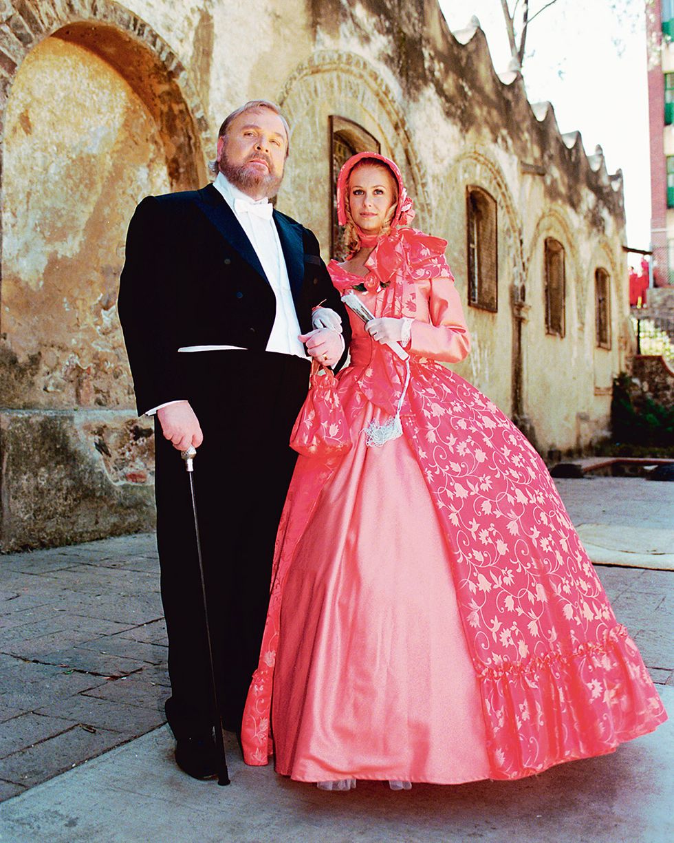 Trousers, Coat, Photograph, Outerwear, Dress, Suit, Formal wear, Pink, Gown, Tradition, 
