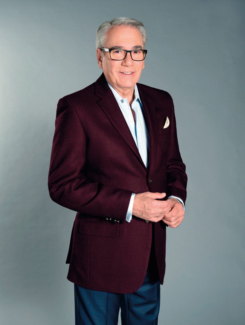 Suit, Blazer, Formal wear, Outerwear, Standing, Businessperson, Tuxedo, White-collar worker, Jacket, Electric blue, 