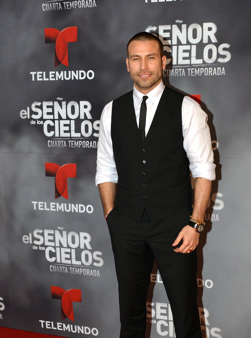 Dress shirt, Collar, Shirt, Suit trousers, Carmine, Logo, Tie, Advertising, Muscle, Pocket, 