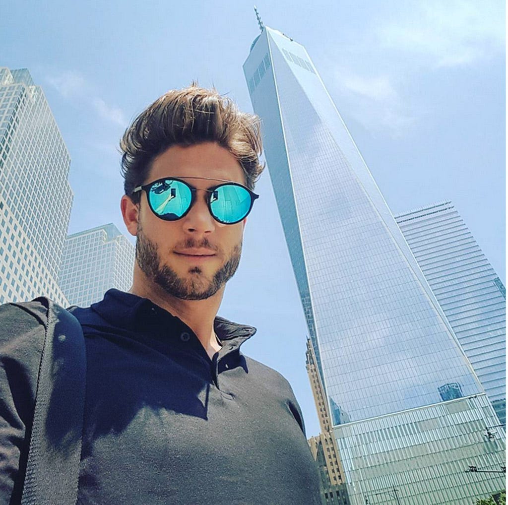 Eyewear, Vision care, Glasses, Sleeve, Shirt, Facial hair, Collar, Sunglasses, T-shirt, Goggles, 