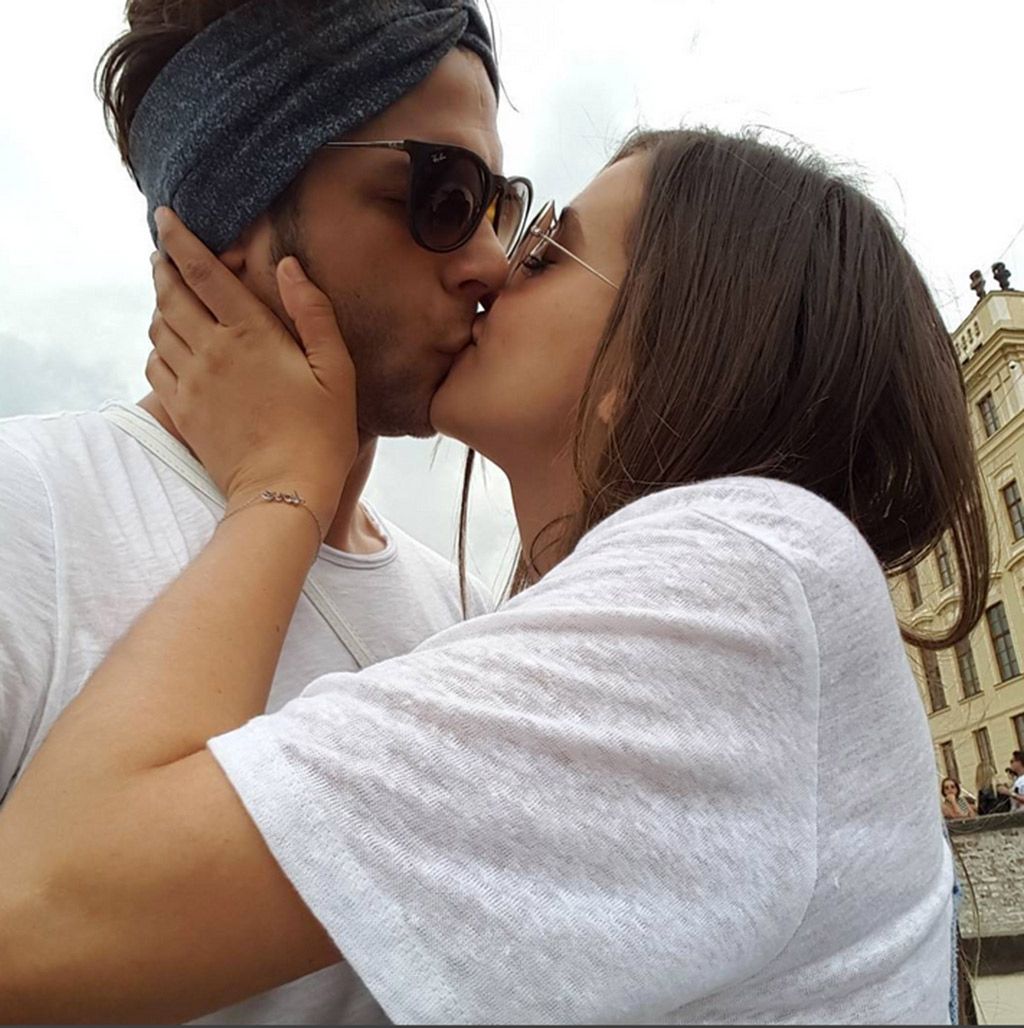 Eyewear, Lip, Glasses, Elbow, Kiss, Sunglasses, Interaction, Cap, Romance, Love, 