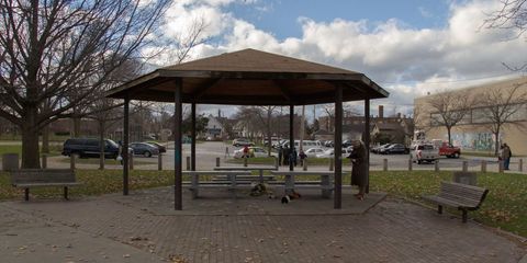 Bench, Public space, Gazebo, City, Shade, Outdoor furniture, Outdoor bench, Street furniture, Parking, Tints and shades, 