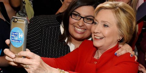 Hillary Clinton takes a selfie with a supporter