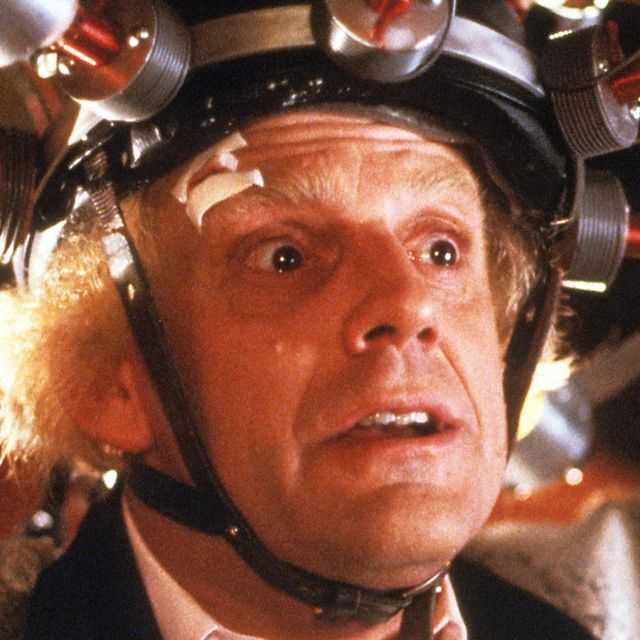 Christopher Lloyd in Back to the Future wears a silver jacket and head contraption
