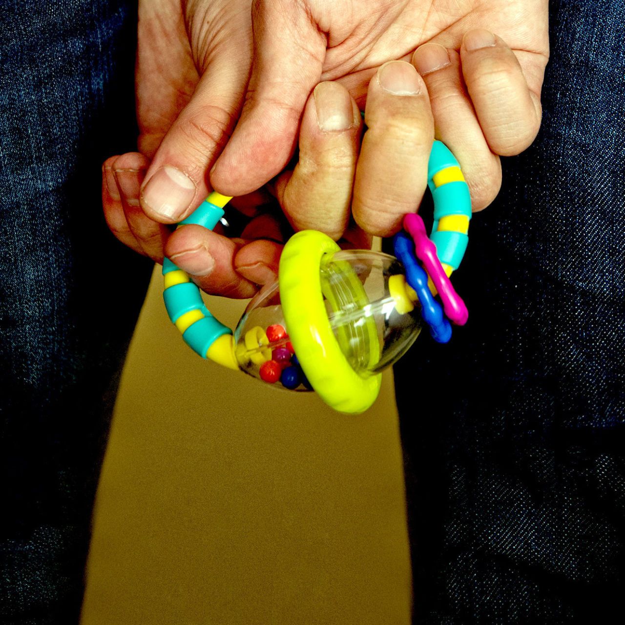 Finger, Nail, Colorfulness, Denim, Sweater, Bracelet, Candy, Button, Gesture, Pocket, 