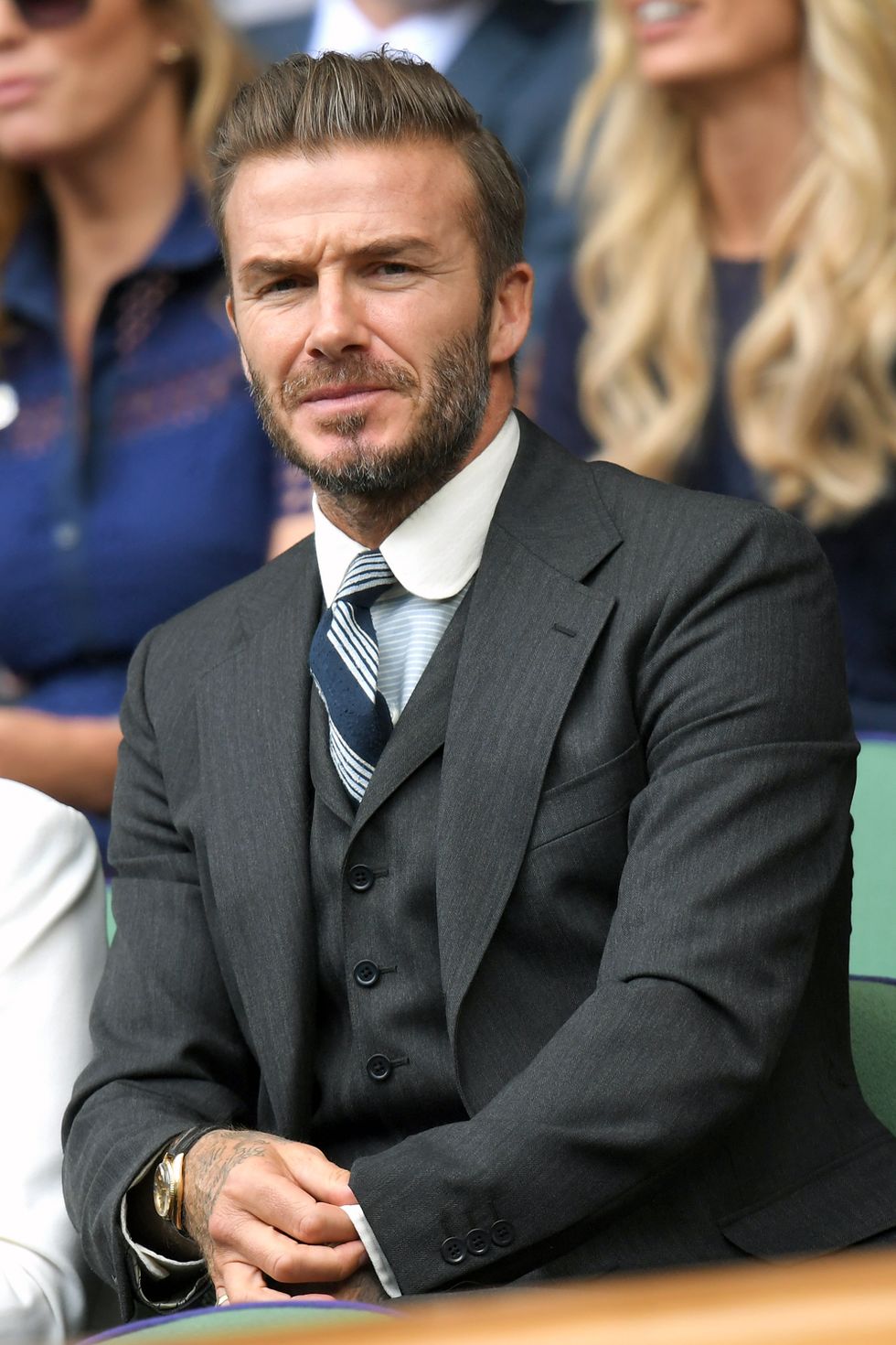 David Beckham wearing Black Long Sleeve Shirt, Black Chinos, Tan