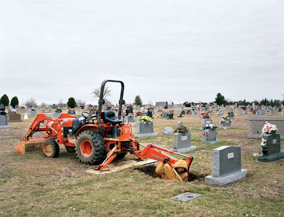 Soil, Machine, Agricultural machinery, Construction equipment, Headstone, Cemetery, Tractor, Tread, Concrete, Plantation, 