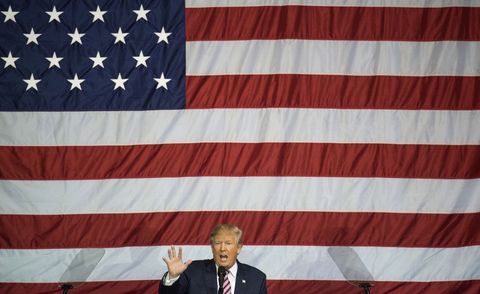 Flag, Microphone, Flag of the united states, Red, Outerwear, Coat, Public speaking, Blazer, Pattern, Government, 