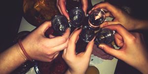 Finger, Hand, Nail, Alcohol, Drink, Alcoholic beverage, Wrist, Thumb, Bottle, Camera lens, 