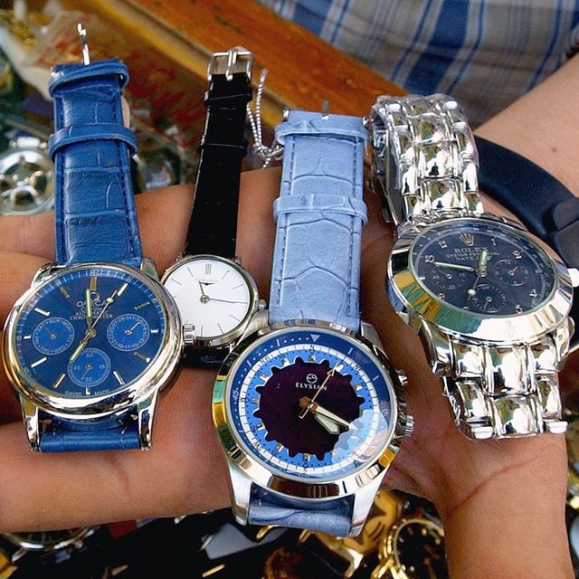 Blue, Product, Watch, Analog watch, Wrist, Watch accessory, Glass, Metal, Font, Everyday carry, 