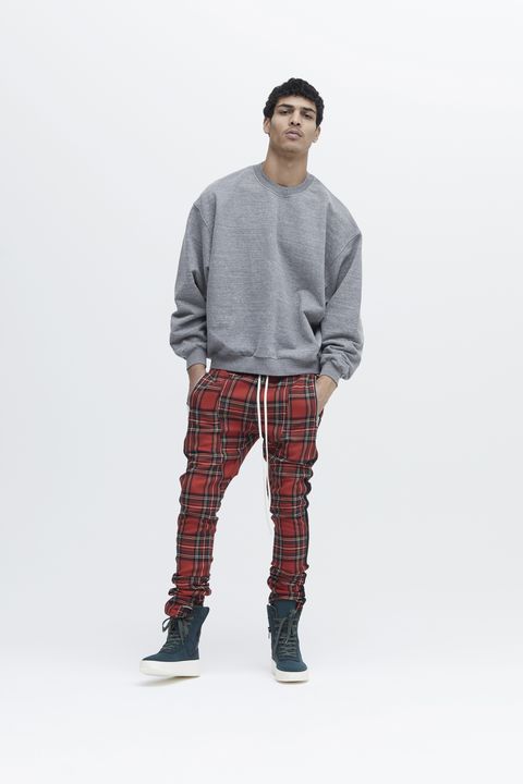 Plaid, Sleeve, Trousers, Human body, Collar, Shoulder, Textile, Standing, Joint, Tartan, 