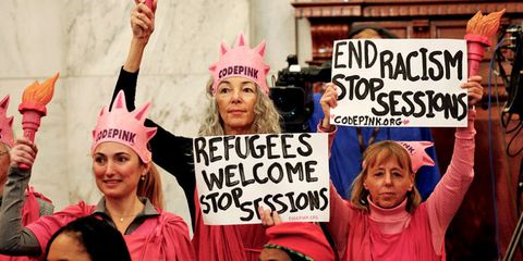 Mouth, People, Pink, Headgear, Costume accessory, Headpiece, Hair accessory, Protest, Gesture, Celebrating, 