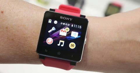Electronic device, Watch, Wrist, Red, Display device, Technology, Gadget, Magenta, Font, Watch accessory, 