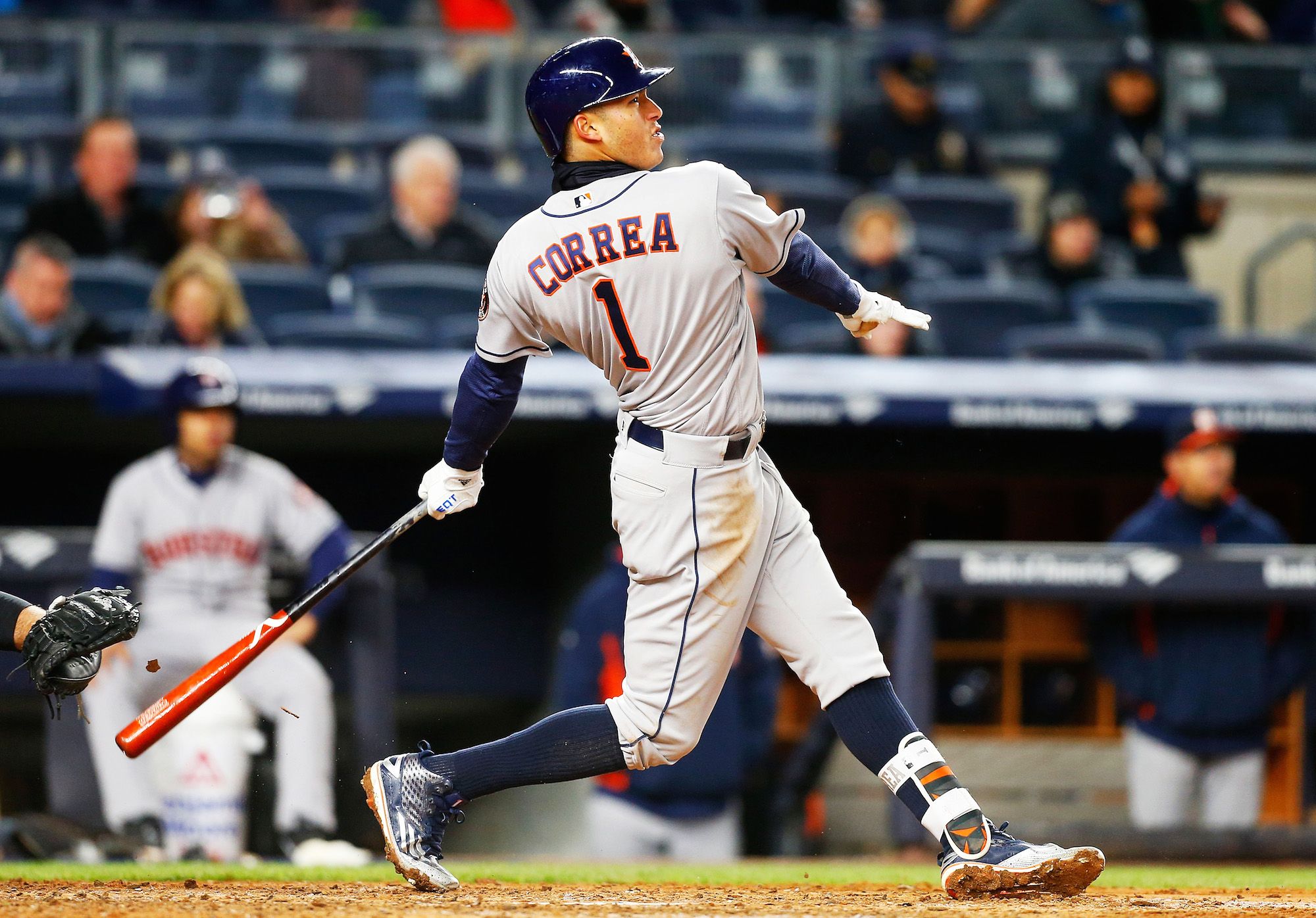 Carlos Correa of the Puerto Rico watches his two-run home run to