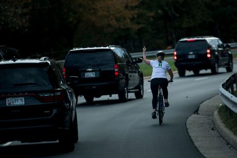 Cyclist gives Trump the middle finger