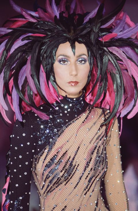 cher in a feathered headpiece in 1972
