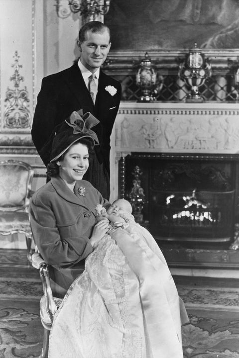 15th December 1948: Princess Elizabeth and The Prince Philip, Duke of Edinburgh with Prince Charles after his christening at Buckingham Palace.