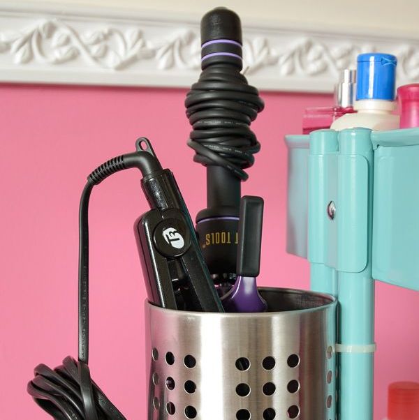here's an excuse to finally pick up that super cheap kitchen utensil holder you've been eye ing at ikea for sometime it's just as handy in your bathroom for storing your curling iron and straightener just throw the hot tools into the container to cool — and avoid nasty burns see more at polka dot chair »