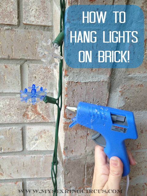 how to hang garland and hanging hack, glue lights on brick