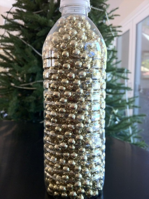 Christmas Decoration Storage Ideas - water bottle garland storage