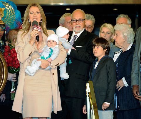 FEBRUARY 16: (L-R) Singer Celine Dion, holding her son Nelson Angelil, her husband and manager Rene Angelil, holding their son Eddy Angelil, their son Rene-Charles Angelil and Dion's mother Therese Dion are greeted as they arrive at Caesars Palace February 16, 2011 in Las Vegas, Nevada. Celine Dion will begin rehearsals for her new show set to debut March 15 at The Colosseum at Caesars Palace.