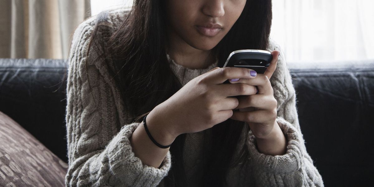 Teen Girl With Phone