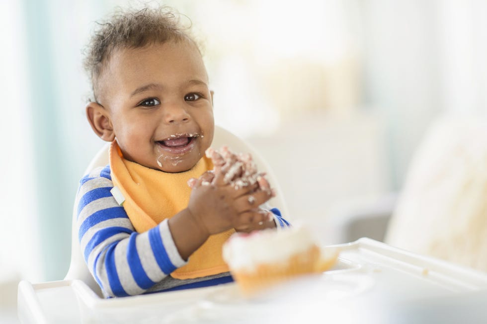 baby boy eating toddler