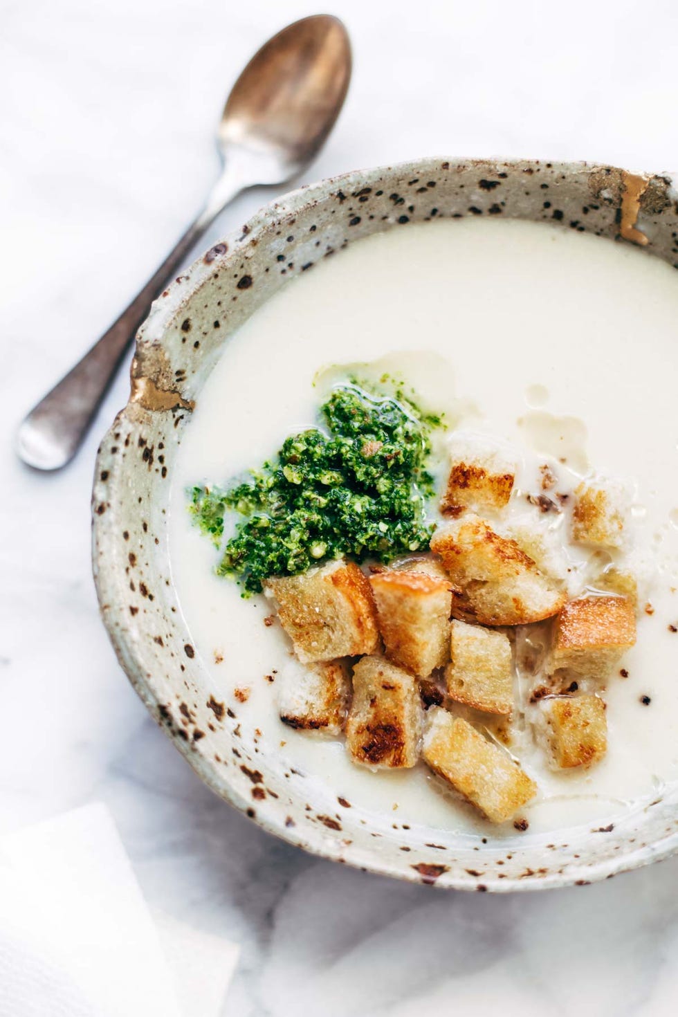 Cheesy Cauliflower Soup with Kale Pesto