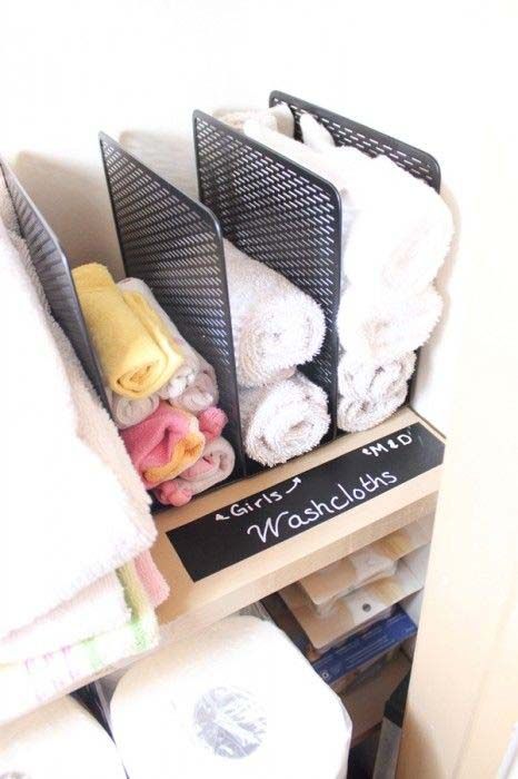 <p>Who wants to use someone else's dirty cloth? (Yuck.) This clever mom identified different compartments in a file holder for each family member to use post-scrub down.</p><p><a href="http://www.realcoake.com/2014/09/linen-closet-organization.html#_a5y_p=2527030" target="_blank"><em>See more at The Real Thing With the Coake Family »</em></a></p>