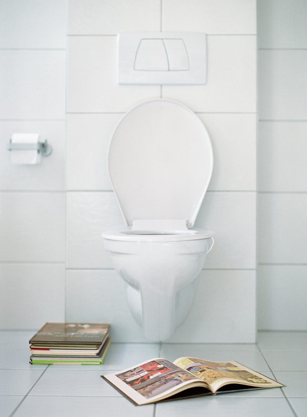 white toilet in a white bathroom