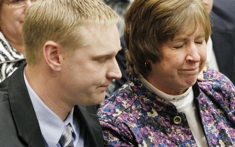 Aaron Thomas, left, and his mother Jan Thomas, right, reacts after Mark Becker is convicted of the first-degree death of their father and husband Ed Thomas at the Butler County Courthouse Tuesday, March. 2, 2010, in Allison, Iowa. A jury found Mark Becker guilty Tuesday of first-degree murder in the shooting of a nationally known high school football coach. It took the jury 24 hours over four days to reach its decision, finding Becker, 24, guilty in the June 24, 2009, killing of Aplington-Parkersburg coach Ed Thomas.