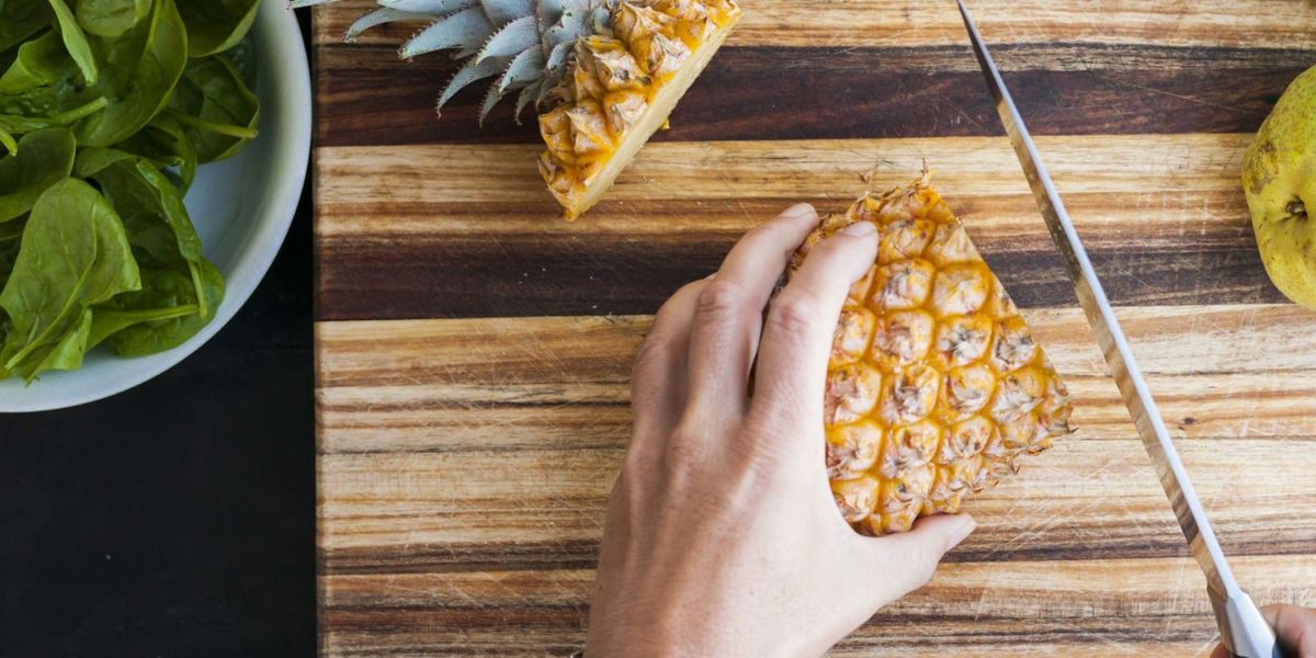 How to Cut a Pineapple Easily - Cutting Up a Pineapple in 4 Steps
