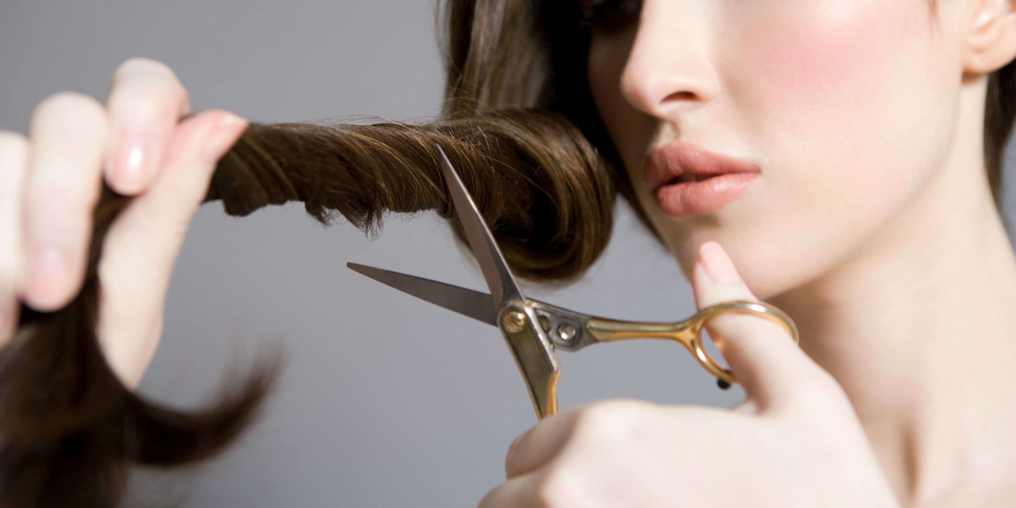 cutting hair with scissors