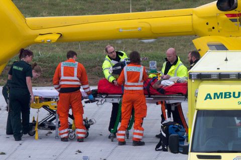 Prince William helping a patient at the East Anglia air ambulance March 23, 2016