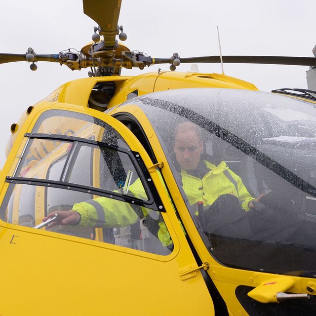 Prince William, The Duke of Cambridge sits in the cockpit of an helicopter as he begins his new job with the East Anglian Air Ambulance (EAAA) at Cambridge Airport on July 13, 2015 in Cambridge, England. The former RAF search and rescue helicopter pilot will work as a co-pilot transporting patients to hospital from emergencies ranging from road accidents to heart attacks.