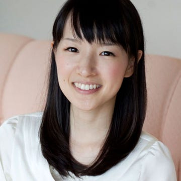 Clothing, Hairstyle, Sleeve, Skin, Textile, Sitting, Dress, Black hair, Couch, Bangs, 