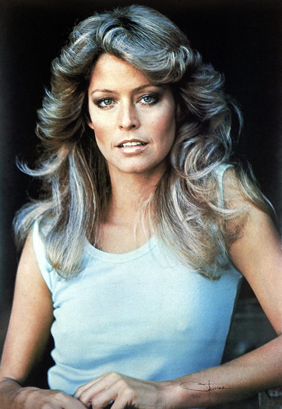 farrah fawcett and her unforgettable hair on charlie's angels inspired countless women to highlight their hair and blow it out into full, sweeping waves