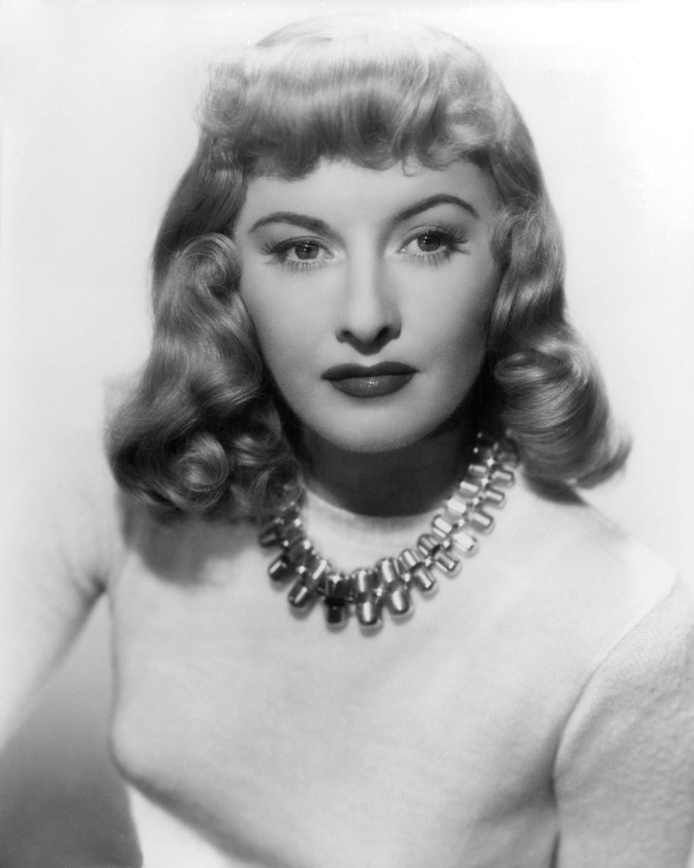 <p>Delicate curls and waves brought softness to thick bangs and <a href="http://orchidorbit.com/beauty/hair/tips/g1647/best-celebrity-lobs/" target="_blank">long bobs</a> like Barbara Stanwyck's.</p>