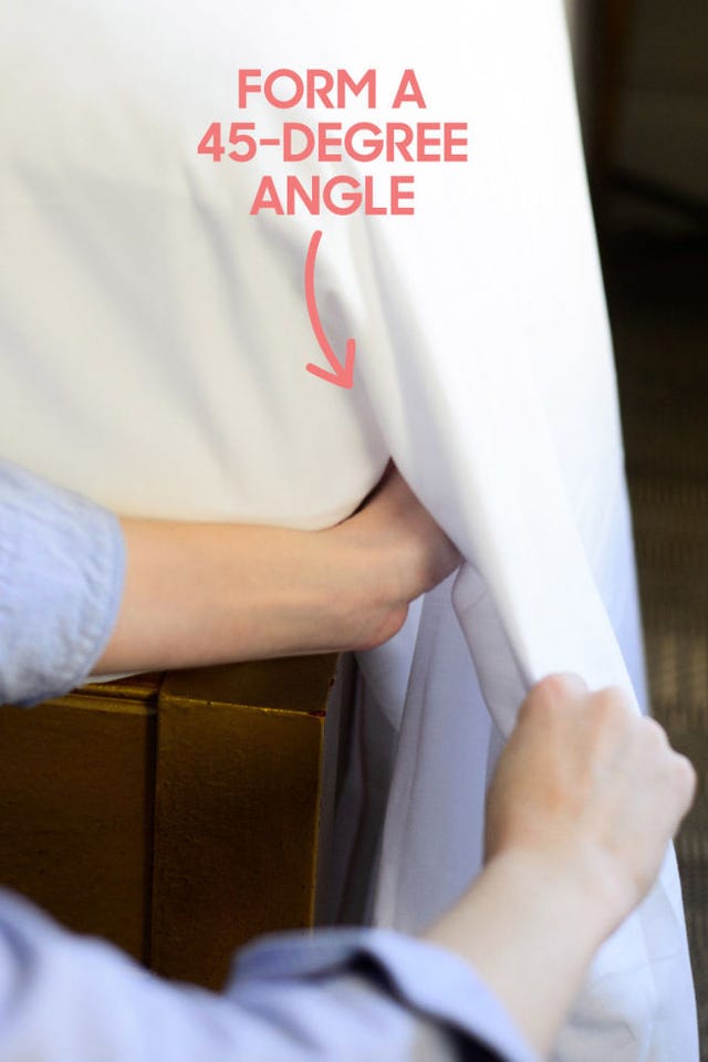 hotel housekeeper 45-degree angle