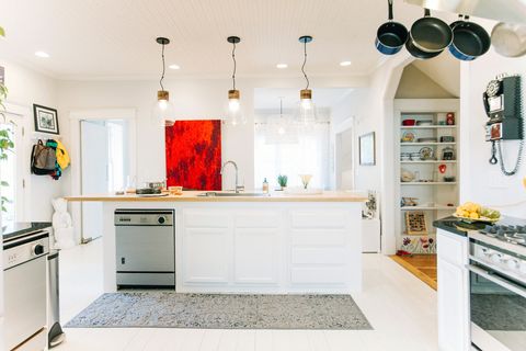 <p>Don't let your kitchen's lighting be an afterthought — your choice can influence the space's overall look and function. "Lighting changes really make a big impact, especially when you can play up the scale," says Jessica Davis of <a href="http://jldesignnashville.com/" target="_blank">JL Design</a>. In this kitchen, bold glass pendants fully illuminate the kitchen work area, but also become a decorative focal point.
</p><p><br>
</p><p>Designer <a href="http://www.warrensheetsdesign.com/" target="_blank">Warren Sheets</a> enjoys using lighting in kitchens to send a subtle message. "I place lights in glass cabinet doors as well as under upper cabinets to light counter surfaces below," he says. "The right kind of light not only helps in food prep, but also encourages people to congregate in the kitchen."</p>