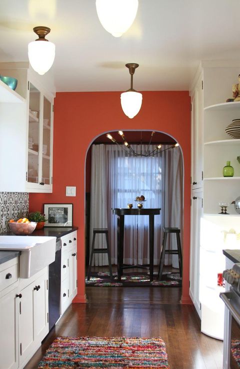 <p>This design trick is the epitome of easy — no heavy-lifting, no new fixtures, just paint (on a single wall!). And yet the result is far greater than the effort you'll make to get it done.
</p><p><br>
</p><p>"A bold wall color paired with white cabinetry can instantly breathe in some new life into a kitchen," says Karen Vidal of <a href="http://www.designvidal.com/" target="_blank">Design Vidal</a>.</p>