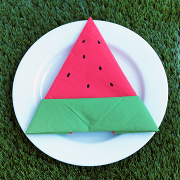 Learn how to fold a napkin into a watermelon.